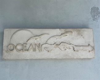 Concrete and plaster “Ocean” sign