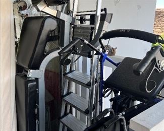 2 wheelchairs, a sit-up bench, a ladder, and a doctor’s weight scale