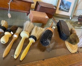Antique barber shop tools and brushes