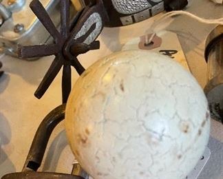 Clay cue ball, metal spurs