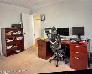 office  desk and office shelf and chair