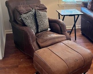 Thomasville leather chairs.  With some leather cleaner and polish, these pieces will look brand new.  Top grain leather.  There are two of these chairs, one ottoman.