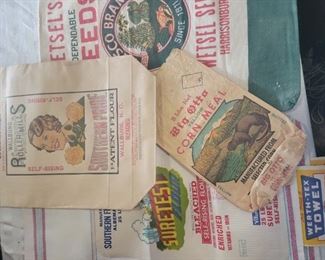 Dozens of cloth and paper flower bags