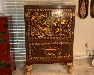 Antique metal dragon onlay cabinet
