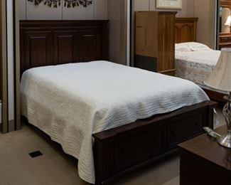 Universal Furniture bed with storage drawers.