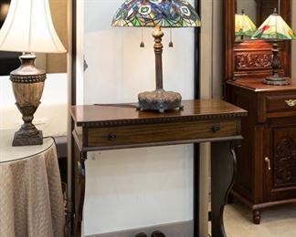 We have several Tiffany Style Lamps