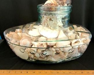 Glass boat and shells 