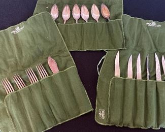 Silver Colored Flatware with Green Holders