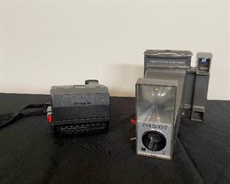 Two Polaroid Cameras