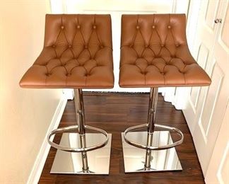$500 Pair of Constantini Pietro "Club" barstools by designer G. Soressi, with metal frames, contemporary styling, and button upholstery on seat and back. They swivel and the height is adjustable. Retail for $1,590/ea new. 29-39" H x 18" W x 19" D. Seat height: 22-32". Additional photos available.