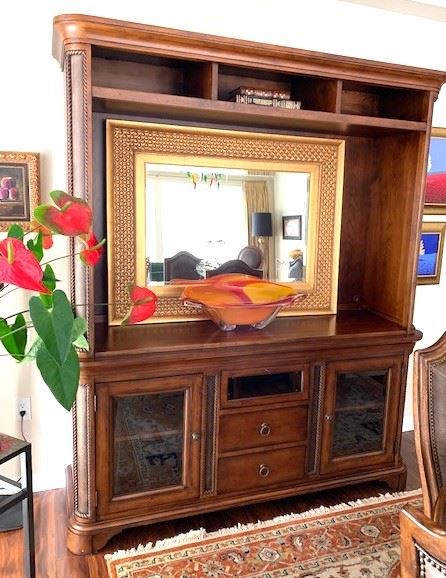 NOW $175 Reba Furniture 2 pc buffet and hutch, or use as an entertainment center. Bevel glass in the doors. Center drawer drops open. Top: 50" H x 67" W x 20" D. Bottom: 34" H x 70" W x 22" D. Additional photos available.