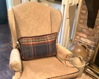 One of two matching wingback chairs
