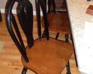 3 of 4 matching wood dining chairs