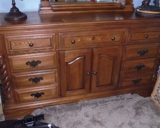 Heirloom Traditions solid wood bedroom suite: all dove tail construction  7 drawer & 2 door dresser w/mirror
