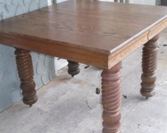 3' x 3' solid oak table w/twist legs & wood casters