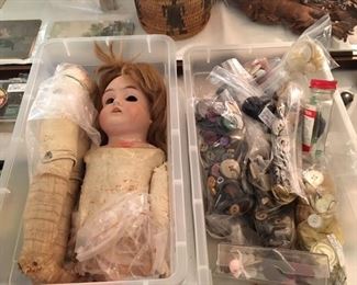 antique German bisque doll and collection of vintage buttons