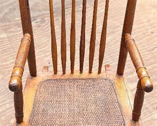 CHILD'S ANTIQUE OAK ROCKING CHAIR
