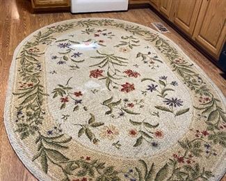 OVAL AREA RUG; LOOKS GREAT IN A KITCHEN. THERE ARE SEVERAL MORE AREA RUGS & THROWS