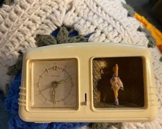 SMALL UNIQUE WALTHAM CLOCK. DOESN'T WORK & IS MISSING SOME PARTS, BUT AN EXCEPTIONAL PIECE. CASE IS BAKELITE.