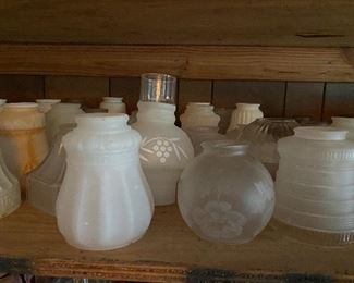 Lots of vintage globes and shades