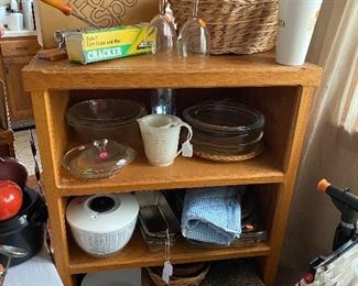 Salad Spinner, Measuring Cups, Baking Pans, Casserole Dishes (Fire King, Pyrex, and more), Glass Lids, Metal Veggie Slicer, Cutting Boards, Baskets, Rumchata Drink Holder, Wooden Picnic Silverware Caddy, and more 