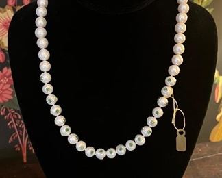 Turkish pearl necklace with hand set emeralds on front 17 pearls w/ sterling clasp and 3" extender- $145