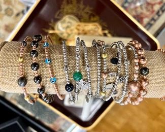 Stackable bracelets- assorted- some with charms or evil eyes- $20 each