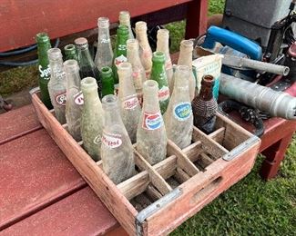 Case of multiple vintage bottles 