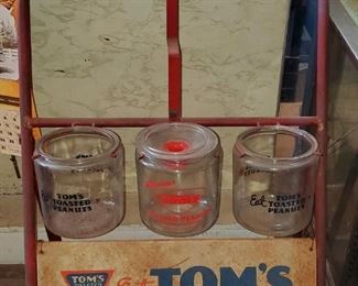 Tom's jar rack with sign, 3 Tom's jars. Each sold separately. 