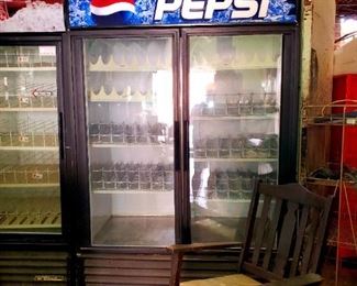 Wire locker baskets, Pepsi double door cooler, vintage wooden rocker