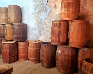 antique wooden barrels (whiskey barrel size)
