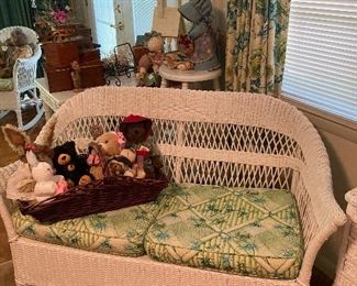 Wicker settee with basket of Boyd’s Bears and rabbits
