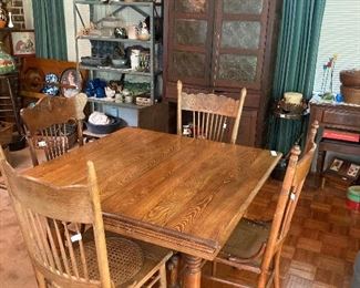 Unique oak table, 4 different dining chairs