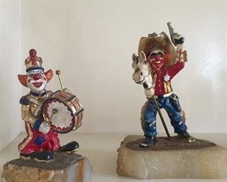 Vintage Ron Lee figurines. All American and Le Bozo Sheriff.