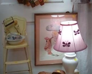 Roll high chair from yesteryear, wooden handcrafted toys,sweet picture and lamp to light up the room