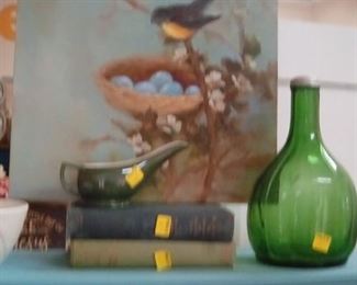 Vintage sprinkler bottle, oil of mama bird watching over her eggs.