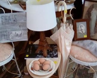 World Tower lamp, soda fountain chairs, French worded sign.