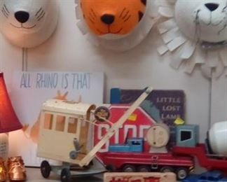 Old metal construction toys, felt mounted animal heads