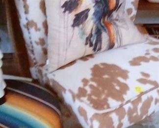 Cowhide pattern upholstered chairs (2), unique pillow, saddle cloth covered stool