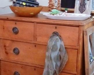 Fantastic old solid wood chest of drawers. Love the hardware! Wooden legs, iron cross, wooden bowl, mirrored door from old wardrobe.