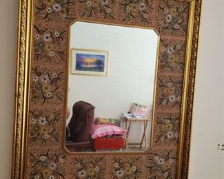 From Spain a Gilt wood and terra cotta tile frame mirror.
