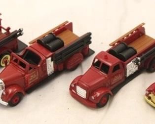 5619 - 4 Toy fire trucks