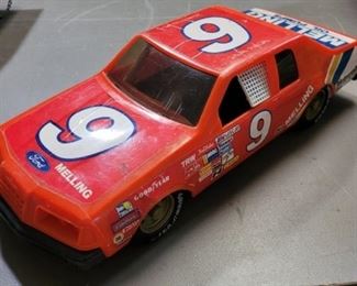 5737 - Plastic #9 toy racecar