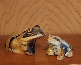 Carved frog figurines