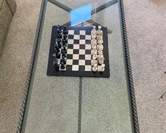 Glass and metal coffee table and stone chess set