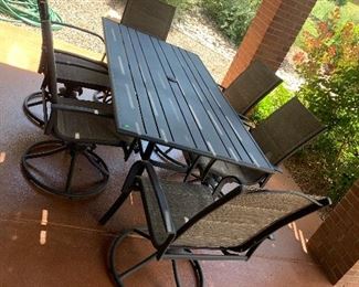 Patio set with six swivel chairs 