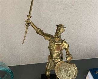 Brass statue, man is about 12” tall