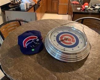 Cubs hat and clock 
Hat is SOLD
