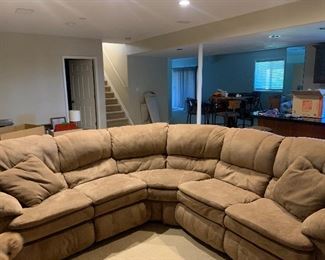 Large sectional, has damage to frame on left end