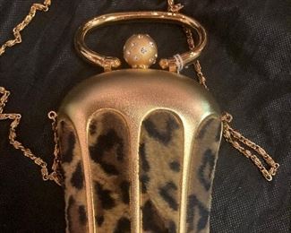 Comeco goldtone and leopard skin purse